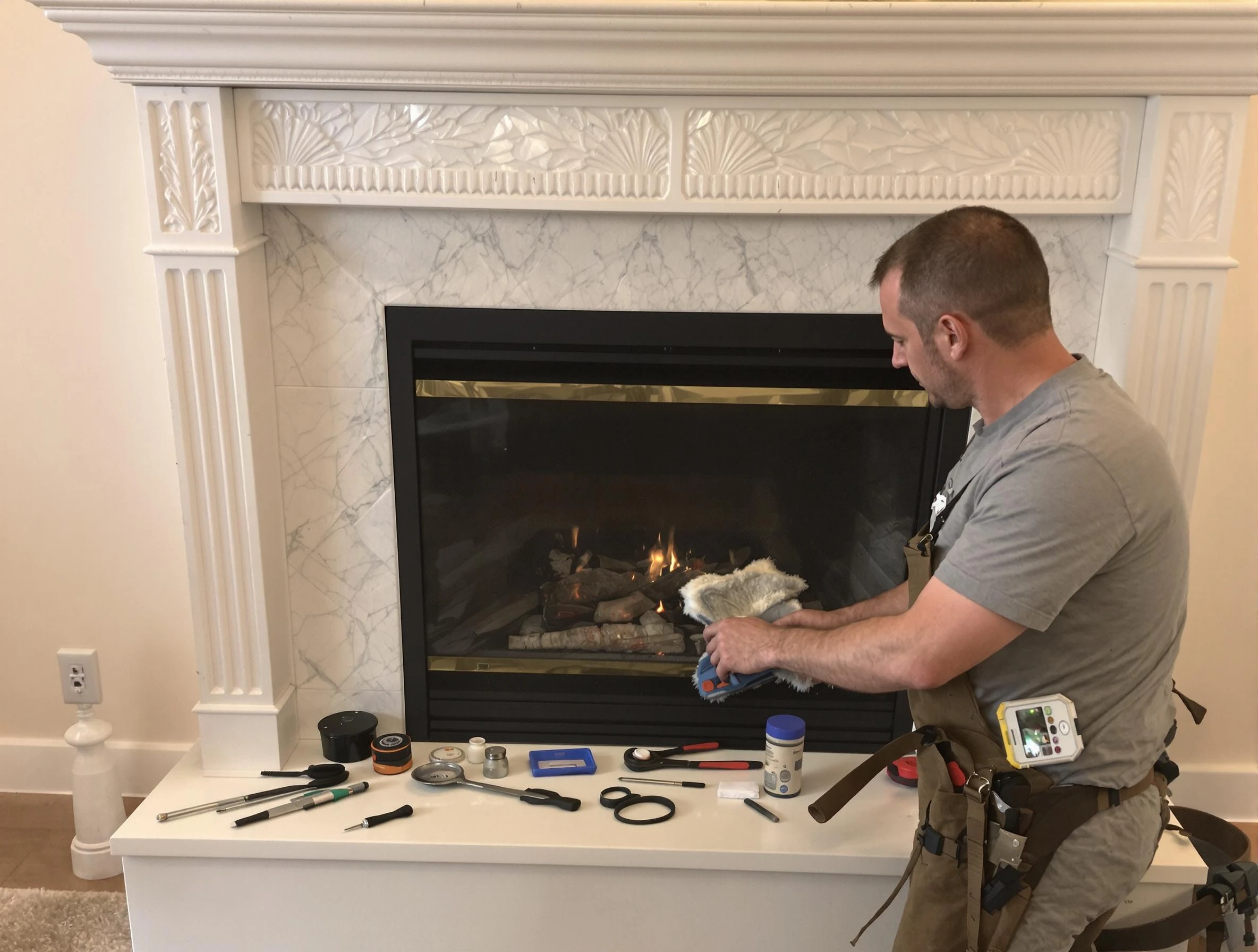 Ogden Chimney Sweep performing fireplace maintenance in Ogden, UT